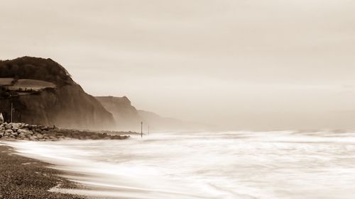 Scenic view of beach against sky