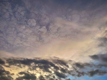 Low angle view of clouds in sky during sunset