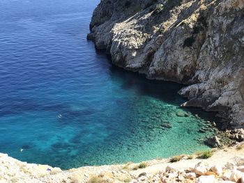 Mali bok beach surrounded by cliffs, island cres.