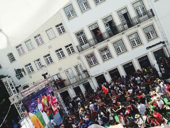 High angle view of people on building in city