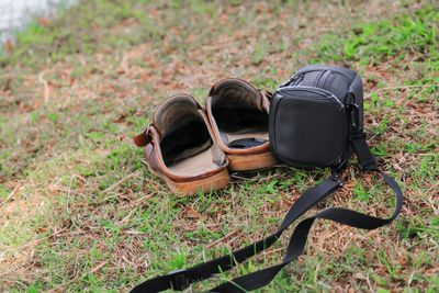 High angle view of shoes on field