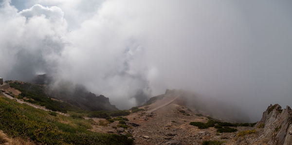 Panoramic view of volcanic landscape against sky