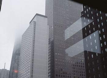 Low angle view of buildings against sky