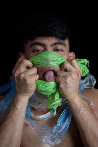 Portrait of man holding ice cream