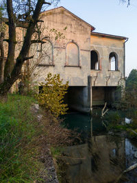 View of old building by canal