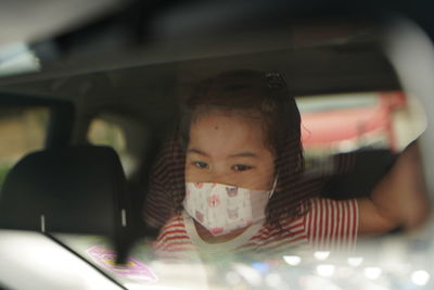 Portrait of boy in car