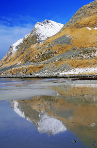 Scenic view of frozen lake against sky