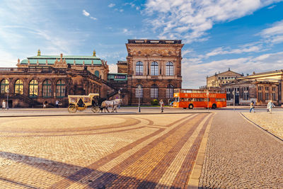 Buildings in city against sky