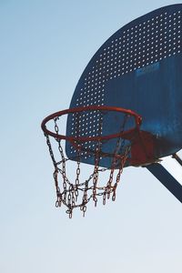 Old basketball hoop in the street