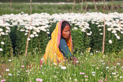 Woman standing on field