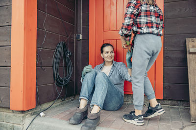 Low section of man standing on street