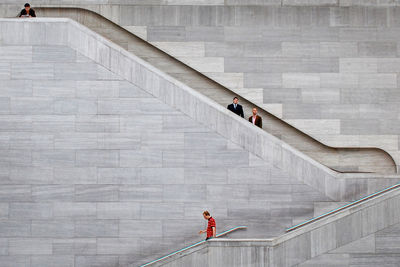 Low angle view of man walking on steps