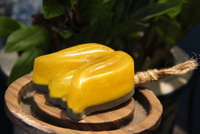 Close-up of yellow lemon on table