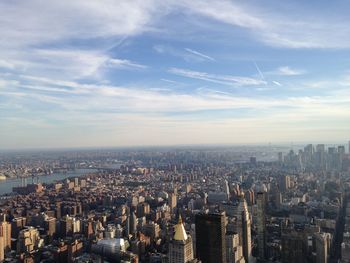 High angle view of city buildings against sky