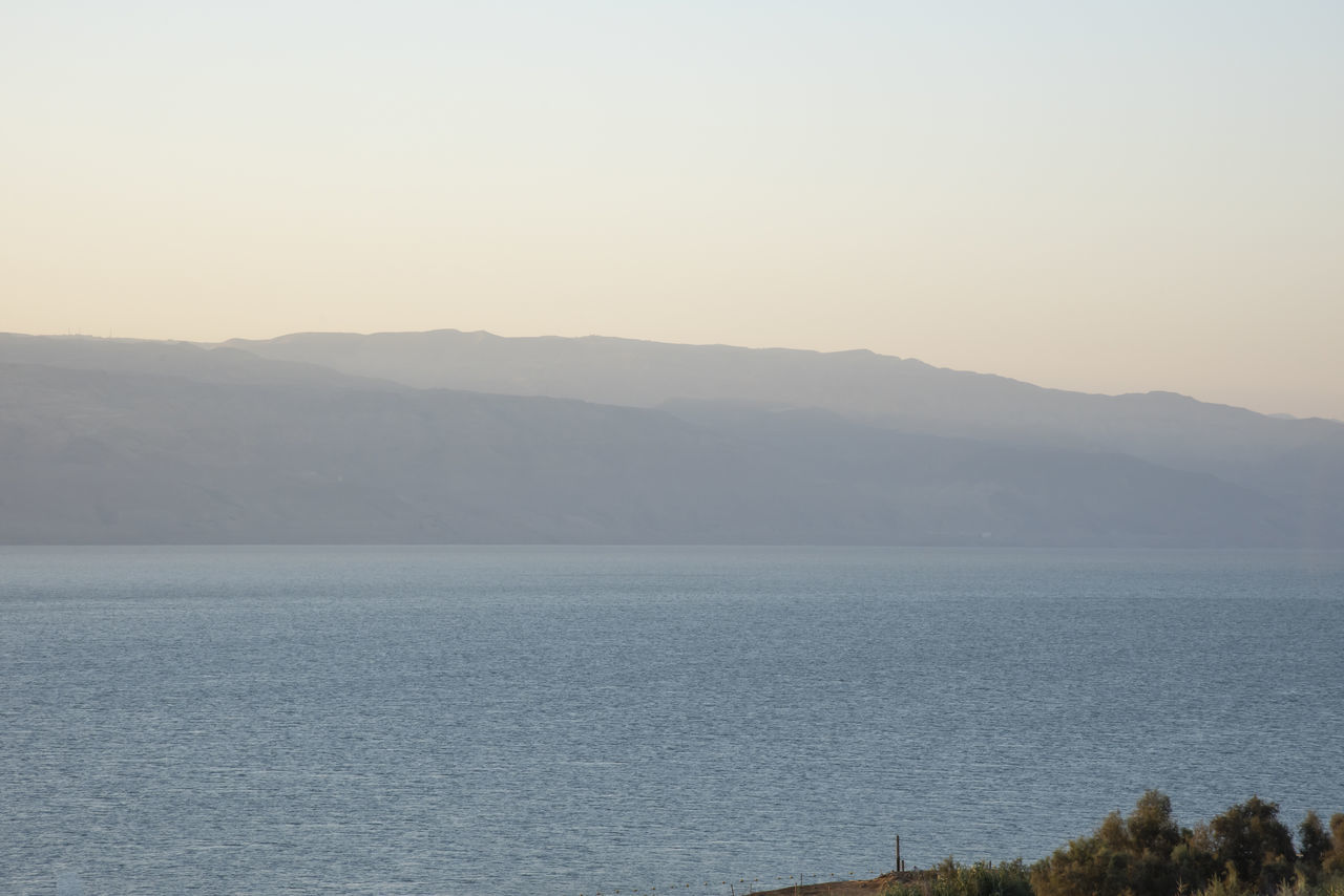 SCENIC VIEW OF MOUNTAINS AGAINST CLEAR SKY