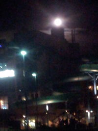 Illuminated street light at night