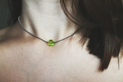 Close-up of woman wearing necklace