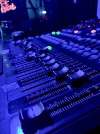 Close-up of sound mixer at music concert