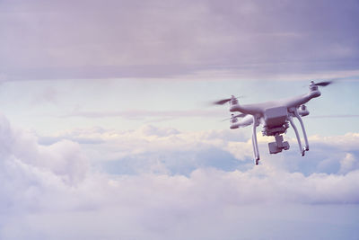 Low angle view of airplane flying in sky