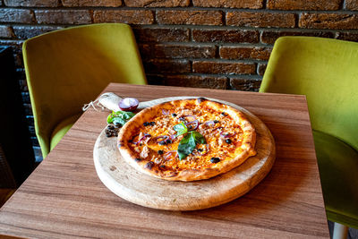 High angle view of pizza on table