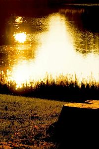Scenic view of sunset over lake
