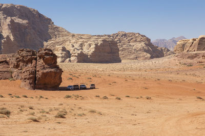 Rock formations in desert against sky