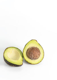 Close-up of fruits against white background