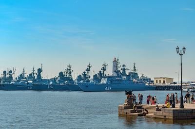 Group of people in front of buildings