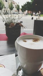 Close-up of coffee cup on table