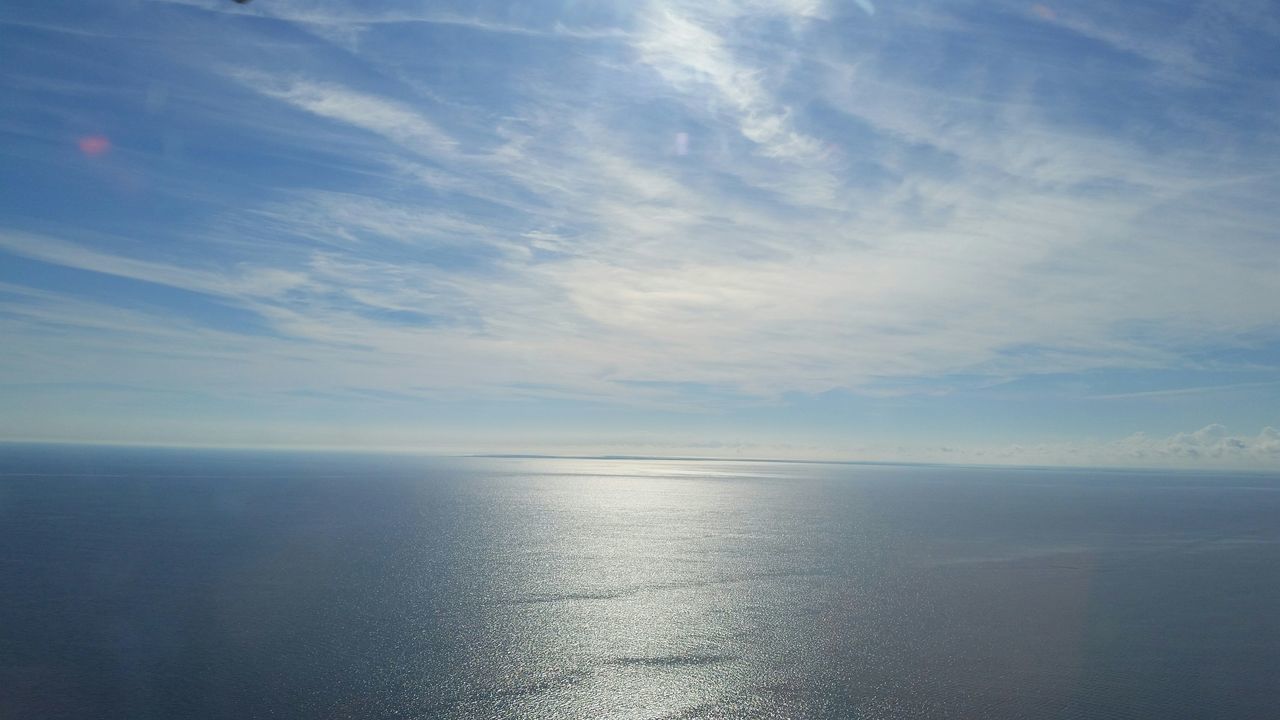 sea, horizon over water, water, tranquil scene, scenics, tranquility, sky, beauty in nature, waterfront, nature, idyllic, cloud - sky, seascape, reflection, cloud, blue, outdoors, cloudy, no people, calm