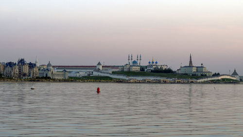 Kazan kremlin by kazanka river against sky