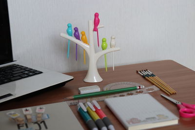 Close-up of colored pencils on table