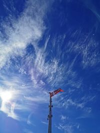 Low angle view of street light against sky