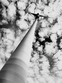 Low angle view of crane against sky