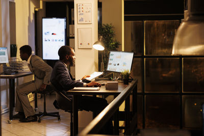 Man using laptop at office