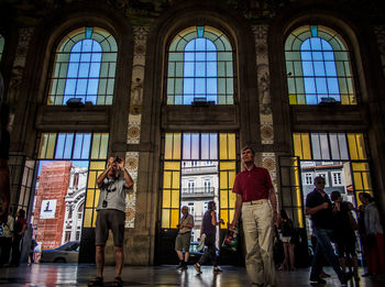 People walking through window