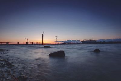 Scenic view of sea at sunset