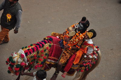 High angle view of people on road in city