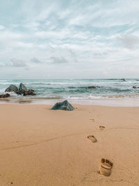 Scenic view of beach against sky