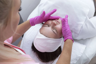 Rear view of woman with daughter