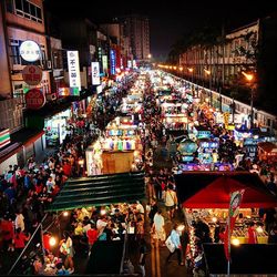 Group of people at market stall