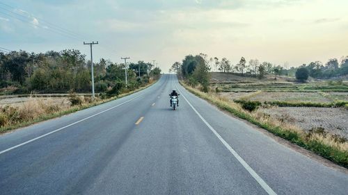 Road passing through country road