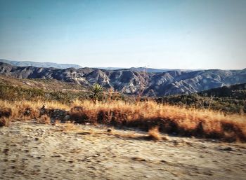 Scenic view of mountains against clear sky