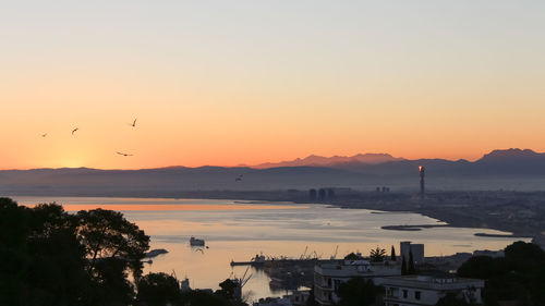 Scenic view of sea against sky during sunset