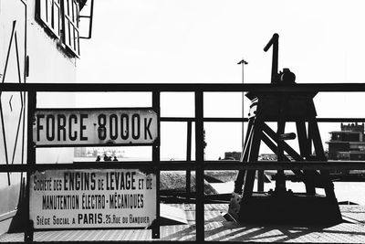 Low angle view of text against clear sky