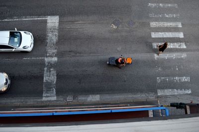 High angle view of people on road in city