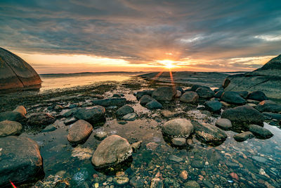 Scenic view of sea against sky during sunset