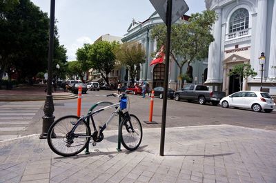 Bicycle parked on road