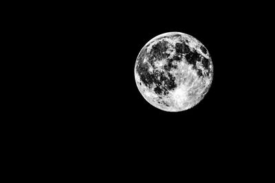 Low angle view of moon in sky