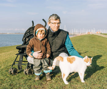 Portrait of man with granddaughter